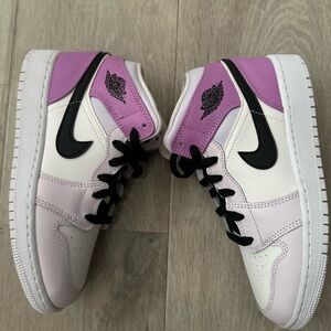 Air JordanPink and White High-Top Sneakers
New never worn 
No box